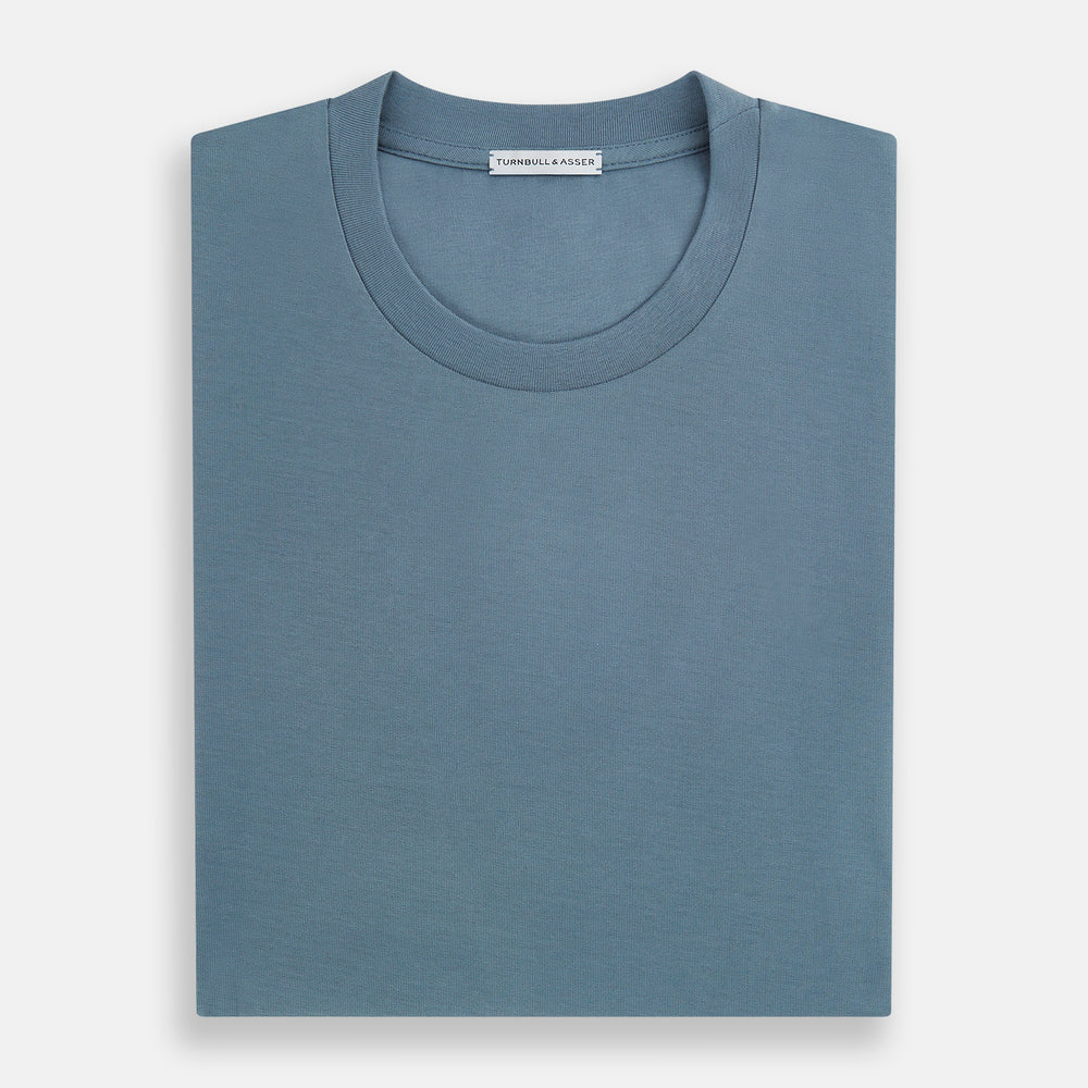 The Turnbull & Asser Pale Blue Short-Sleeve T-shirt features a crew neck and plain design, ideal for everyday wear. Shown flat on a white background.