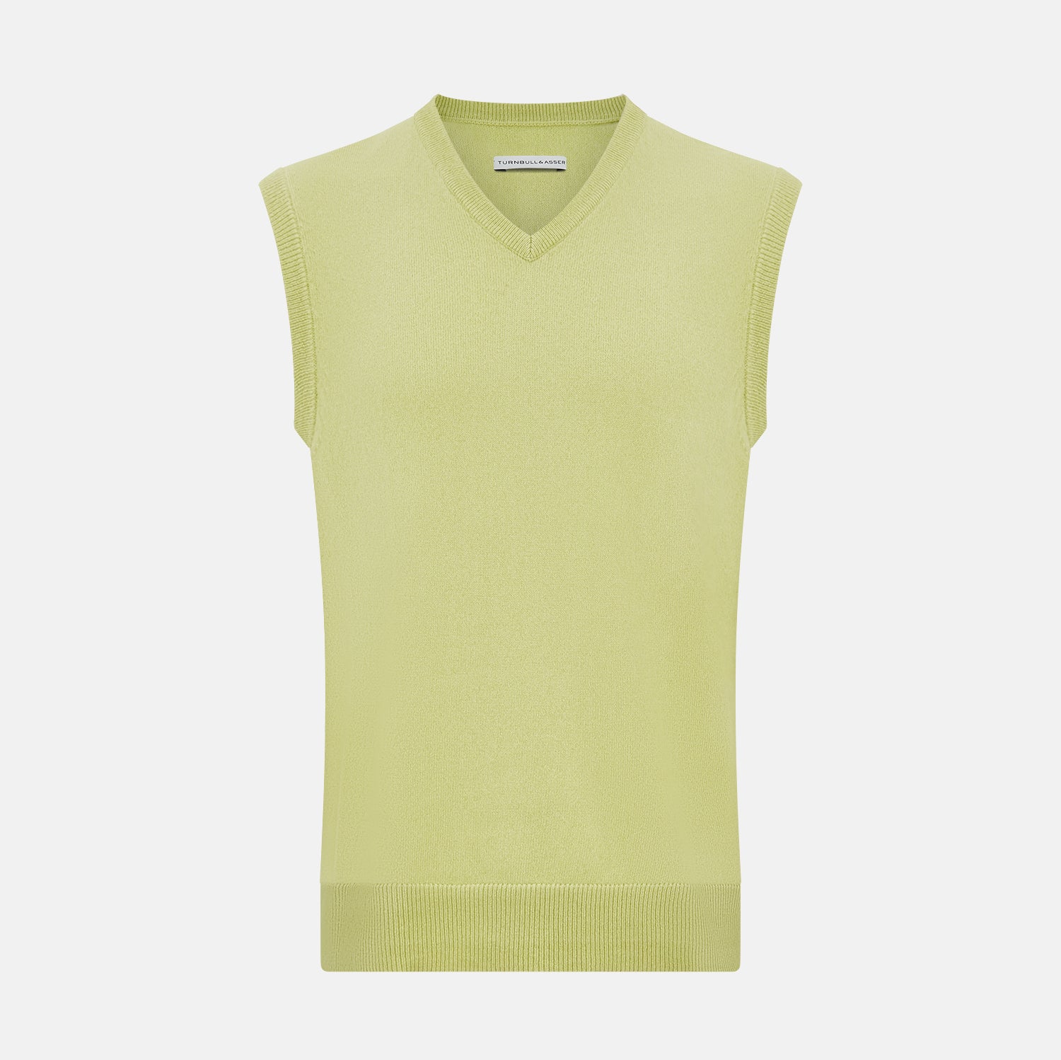 View 1 of product Turnbull & Asser’s Melon Green V-neck Cashmere Vest is shown on a plain white background. This sleeveless men’s jumper features ribbed neckline, armholes, and hem for subtle detail.