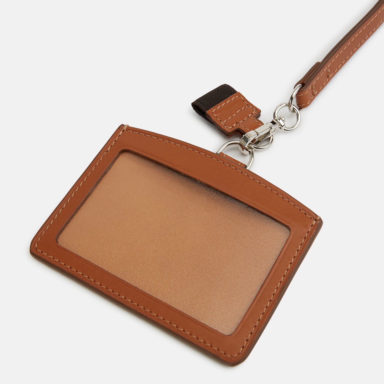 View 3 of product The Turnbull & Asser Camel ID Card Holder, shown on a white background, features Italian leather in brown with a matching lanyard, silver clasp, keychain tag, and "Turnbull & Asser" embossed in gold lettering.