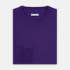 View 4 of product The Turnbull & Asser Purple Merino Round Neck Jumper, a classic men’s knitwear piece, is shown against a white background.