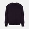 View 3 of product The Turnbull & Asser Dark Purple Fine Merino V-Neck Jumper features long sleeves and a classic knit, shown against a white background.
