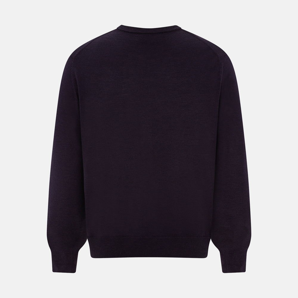 The Turnbull & Asser Dark Purple Fine Merino V-Neck Jumper features long sleeves and a classic knit, shown against a white background.
