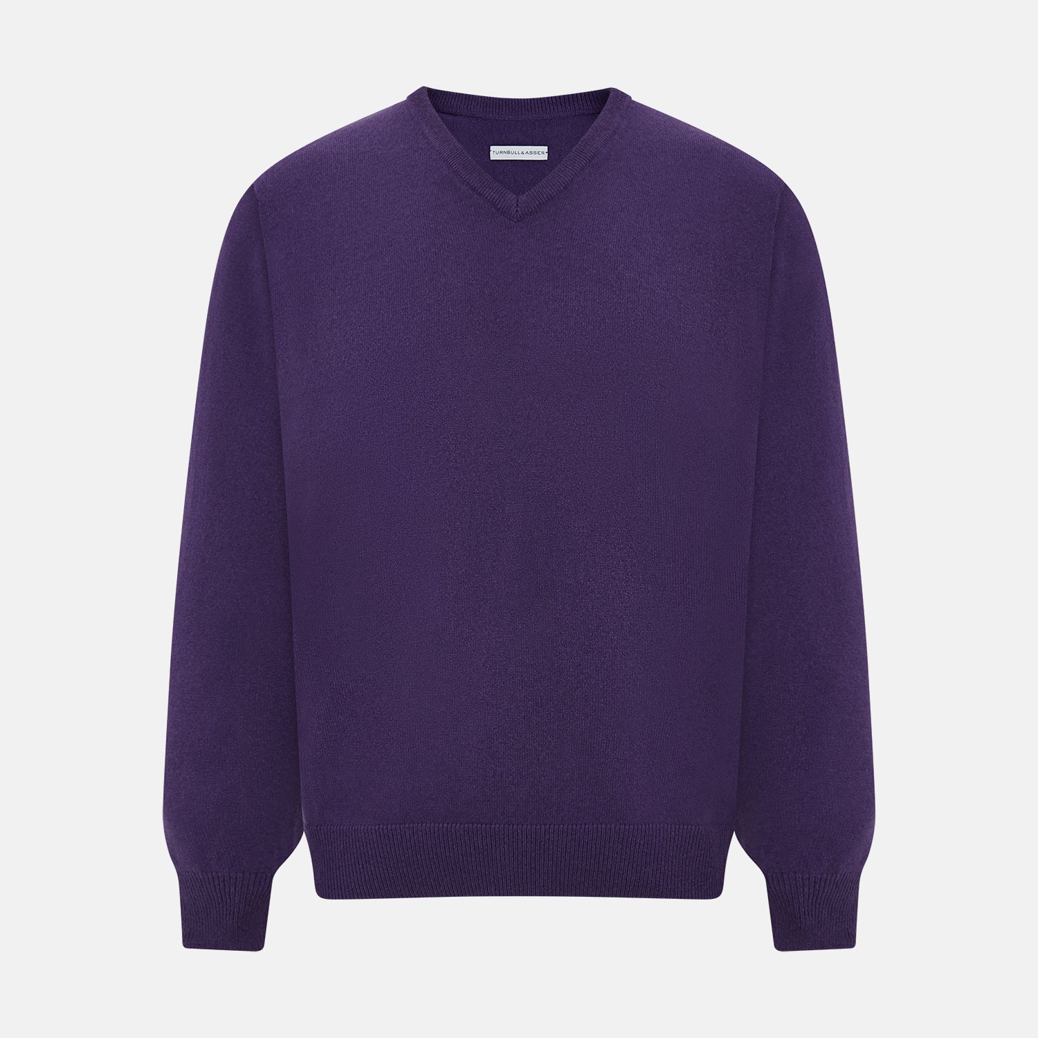View 1 of product The Turnbull & Asser Purple Cashmere V-neck Jumper features long sleeves with ribbed cuffs and hem—a classic knitwear piece for effortless layering, shown against a white background.