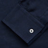 View 3 of product The Turnbull & Asser Navy Weekend Fit Nevis Cotton-Cashmere Shirt features a Dorset collar, 1-button cuffs, and is laid flat on a white background.