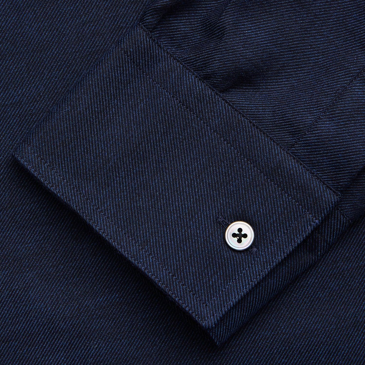 View 3 of product The Turnbull & Asser Navy Weekend Fit Nevis Cotton-Cashmere Shirt features a Dorset collar, 1-button cuffs, and is laid flat on a white background.