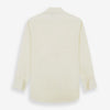 View 5 of product The Tomorrow Never Dies Cream Cotton Hamburg Shirt by Turnbull & Asser is a classic, cream-colored, long-sleeved button-up with a traditional collar and buttoned cuffs—just like the one worn by James Bond.