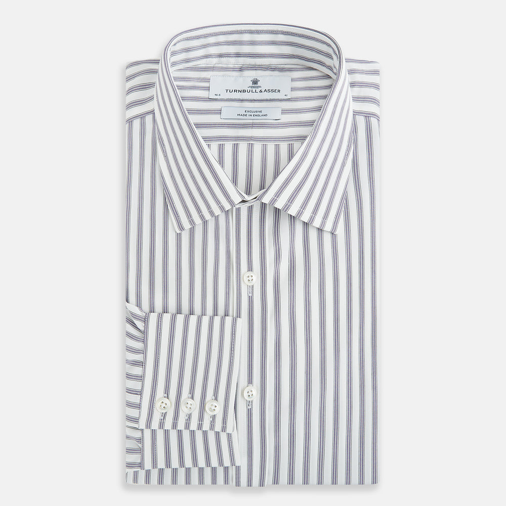 The Purple Multi Stripe Mayfair Shirt from Turnbull & Asser is a pure cotton, collared long-sleeve shirt with white and gray vertical stripes and buttoned cuffs, displayed flat on a white background.