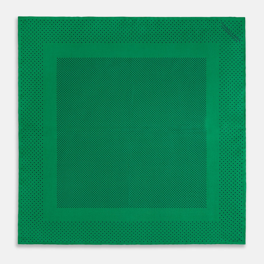The Turnbull & Asser Green Dot Silk Pocket Square is handmade in England and shown neatly folded, revealing the front and part of the underside against a white background.