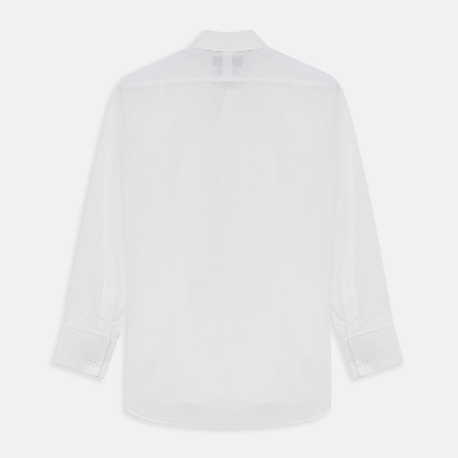View 9 of product The Die Another Day Inspired Voile Dress Shirt by Turnbull & Asser features a white pleated front, button-down closure, and classic collar—laid flat on white to showcase its timeless James Bond style.