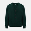 View 1 of product The Turnbull & Asser Forest Green Cashmere Cardigan—featuring long sleeves, a V-neck, button-down front, ribbed cuffs and hem, plus two front pockets—is shown against a plain white background.