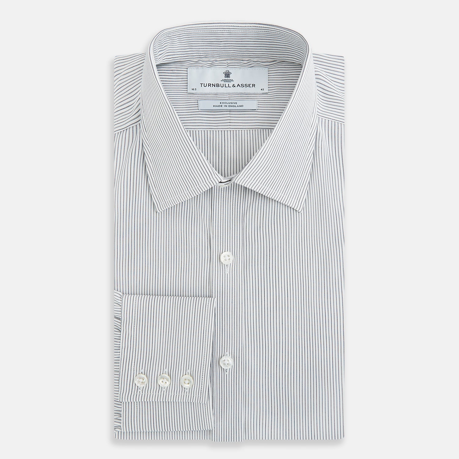 View 5 of product A long-sleeved Midnight Blue Fine Track Stripe Mayfair Shirt by Turnbull & Asser, featuring a T&A collar and white buttons, is laid neatly flat on a white background.