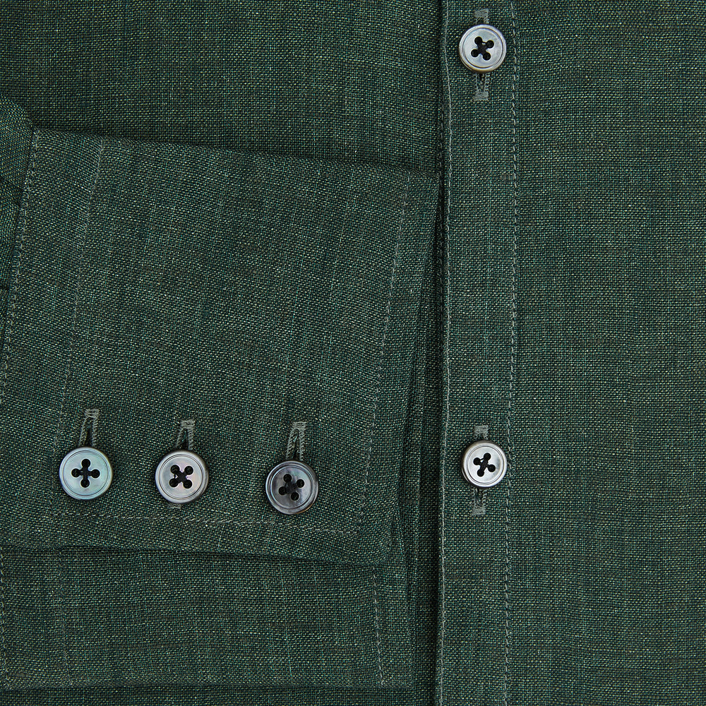The Forest Green Linen Westminster Shirt by Turnbull & Asser features long sleeves, a Turnbull collar, and a button-up design, shown laid flat on a white background.