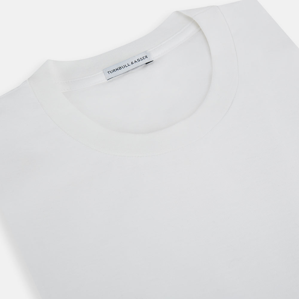 Turnbull & Asser’s White Short-Sleeve T-shirt, shown on a white background, features a classic crew neck and minimalist design without logos or patterns—ideal for versatile everyday wear.