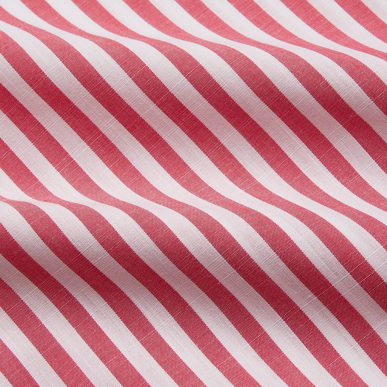 View 4 of product The Pink Candy Stripe Cotton Weekend Fit Finch Shirt by Turnbull & Asser features vertical red and white stripes, a left chest pocket, and a classic collar—an essential men’s wardrobe staple shown against a white backdrop.