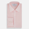 View 5 of product The Turnbull & Asser Pale Pink Linen Mayfair Shirt features a classic, formal style with long sleeves, a collar, and white buttons. Shown laid flat on a white background.