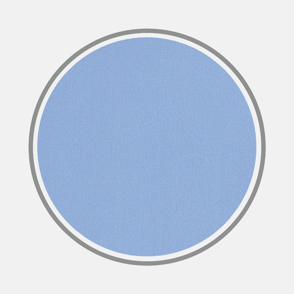 A solid light blue circle, inspired by Turnbull & Asser's Blue Sea Island Quality Cotton Fabric, is centered on white with a thin white border and thick gray outer ring, showcasing the fabric’s subtle texture.