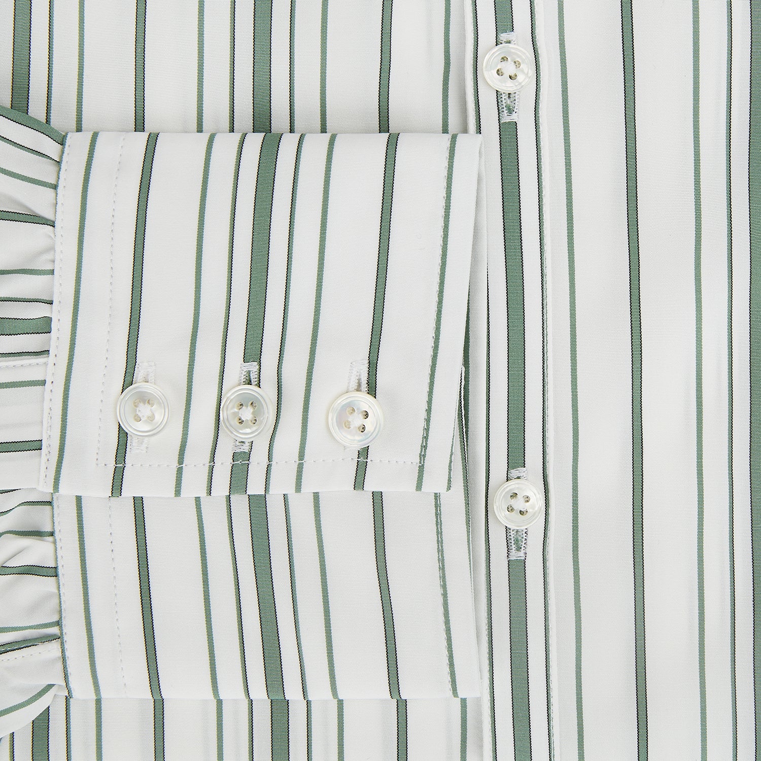 View 4 of product The SAGE GREEN MULTI STRIPE WESTMINSTER SHIRT by Turnbull & Asser features a classic collar, long sleeves, buttoned cuffs, relaxed fit, and vertical green and white stripes—embodying timeless British craftsmanship.