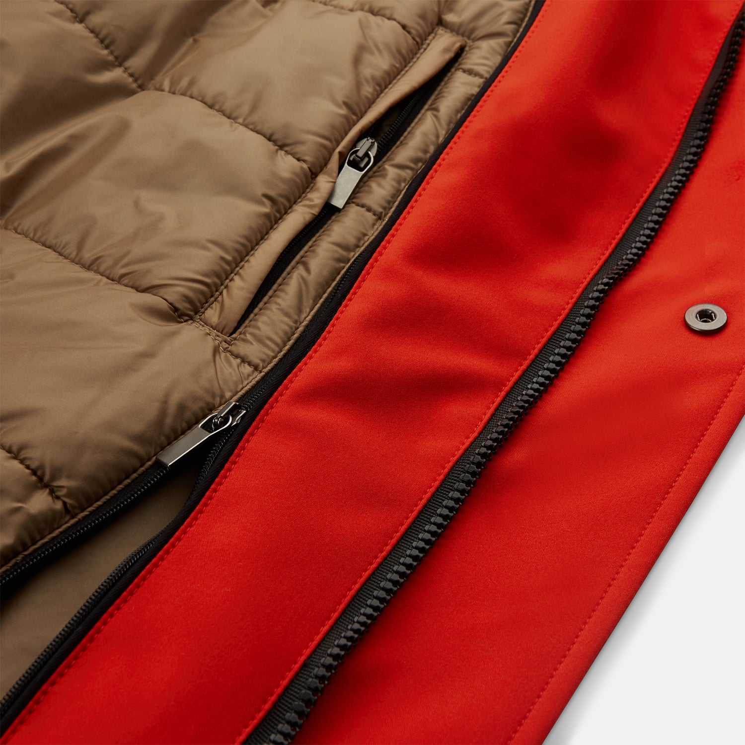 View 9 of product Wearing the Turnbull & Asser Red Walter Sealup Parka with Detachable Liner, black pants, and white sneakers, a person stands in profile against a plain light background—perfect for travel.