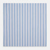 View 3 of product The Hand Rolled Blue Multi Track Stripe Handkerchief by Turnbull & Asser features a square white design with vertical light blue and navy stripes of varying widths—a timeless gentleman’s accessory.
