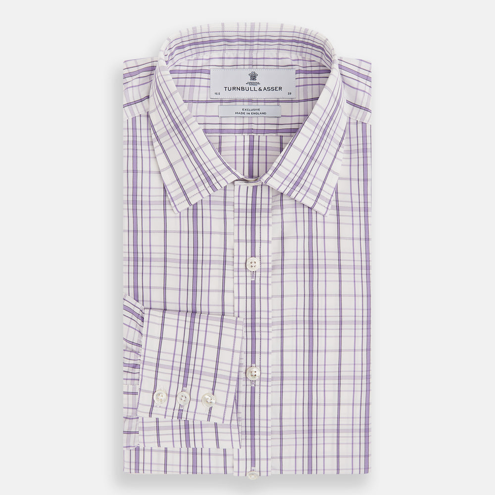 The Turnbull & Asser Purple Plaid Check Mayfair Shirt is a long-sleeve button-down with a pointed T&A collar, featuring a purple and blue plaid pattern on white.
