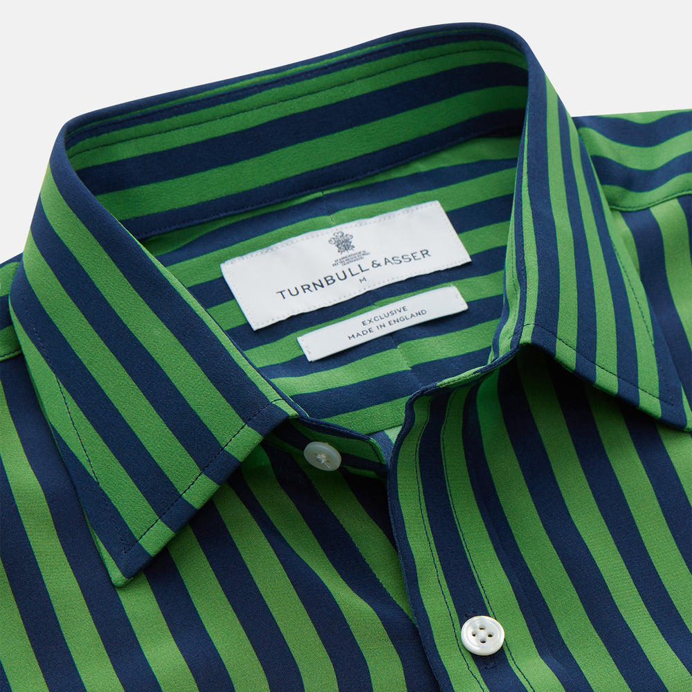 The Turnbull & Asser Green and Navy Candy Stripe Silk Weekend Fit Harold Shirt features long sleeves, a button-up front, collar, and cuffs, displayed laid flat on a white background.