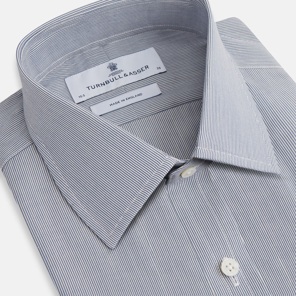The Blue Fine Stripe Mayfair Shirt by Turnbull & Asser is a long-sleeve button-up with a sharp T&A collar and blue fine stripes, shown flat on a white background.