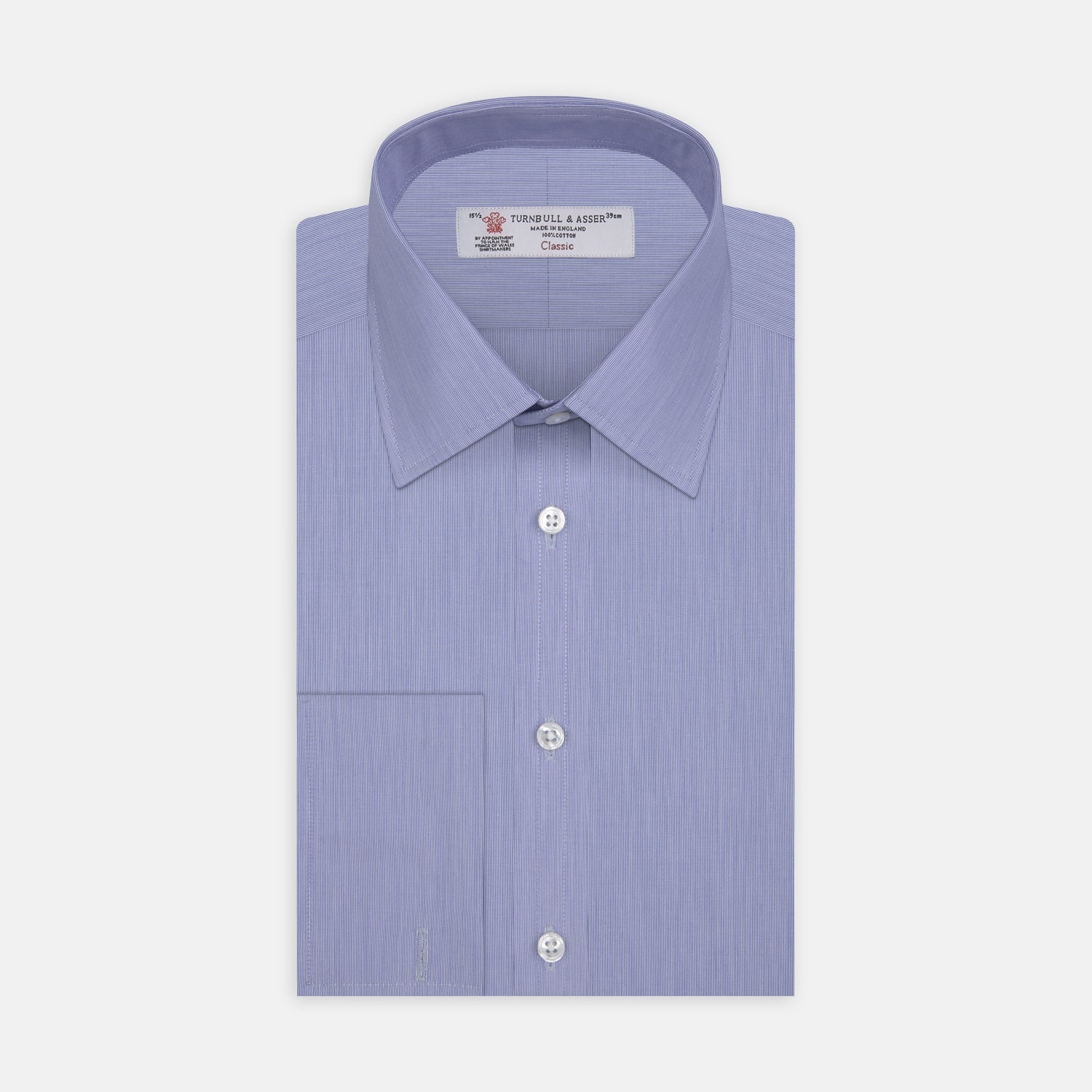 View 1 of product The Turnbull & Asser Blue Hairline Stripe Shirt features a T&A collar, 3-button cuffs, and white buttons. Made from light blue cotton with subtle stripes, it’s neatly folded with the label visible inside the collar on a plain white background.
