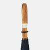 View 3 of product The Turnbull & Asser Navy Umbrella with Maple Crook Handle is open against a white background—an elegant men's accessory inspired by classic style.