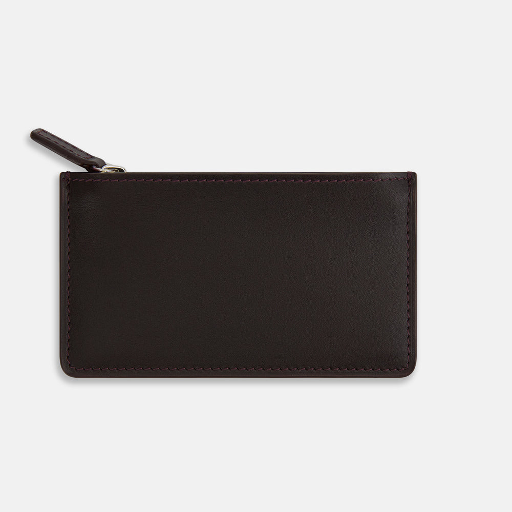 A Burgundy Leather Zip Wallet by Turnbull & Asser, featuring the brand's white logo near the bottom center, displayed on a plain white background.