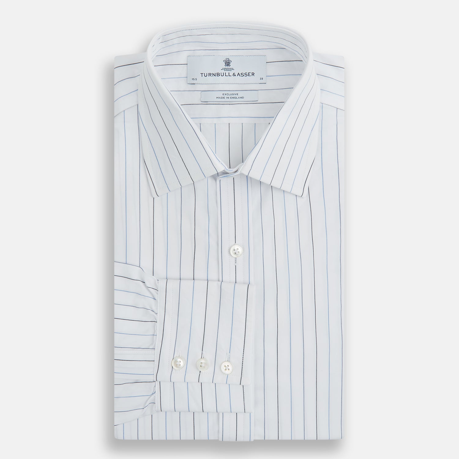 View 5 of product The Blue Wide Pinstripe Mayfair Shirt by Turnbull & Asser is a contemporary long-sleeve button-down with a collar, crafted from white fabric with bold vertical blue pinstripes. It is displayed neatly on a plain white background.