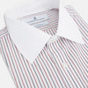 View 2 of product The Red Double Stripe Shirt with contrast T&A collar and cuffs by Turnbull & Asser features classic thin vertical red stripes and solid white collar and cuffs, laid flat on a white background for a timeless look.