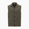 View 6 of product The Turnbull & Asser Olive Collared Linen Waistcoat is a sleeveless olive waistcoat with a collar, front buttons, one chest pocket, and two zippered side pockets, shown against a plain white background.