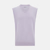 View 1 of product The Turnbull & Asser Lilac Cashmere V-Neck Vest is a sleeveless knit with a ribbed hem, showcasing sophisticated style in light purple against a plain white background.