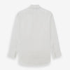 View 5 of product The Turnbull & Asser White Pleated Cotton Dress Shirt features a T&A collar, double cuffs, a button-down front, elegant chest pleats, and a slightly curved hem for a classic formal look.