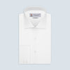View 1 of product A Turnbull & Asser Tailored Fit Two-Fold 120 White Cotton Shirt with a Kent collar and 2-button cuffs is neatly folded against a light blue background, displaying the brand label inside the collar.