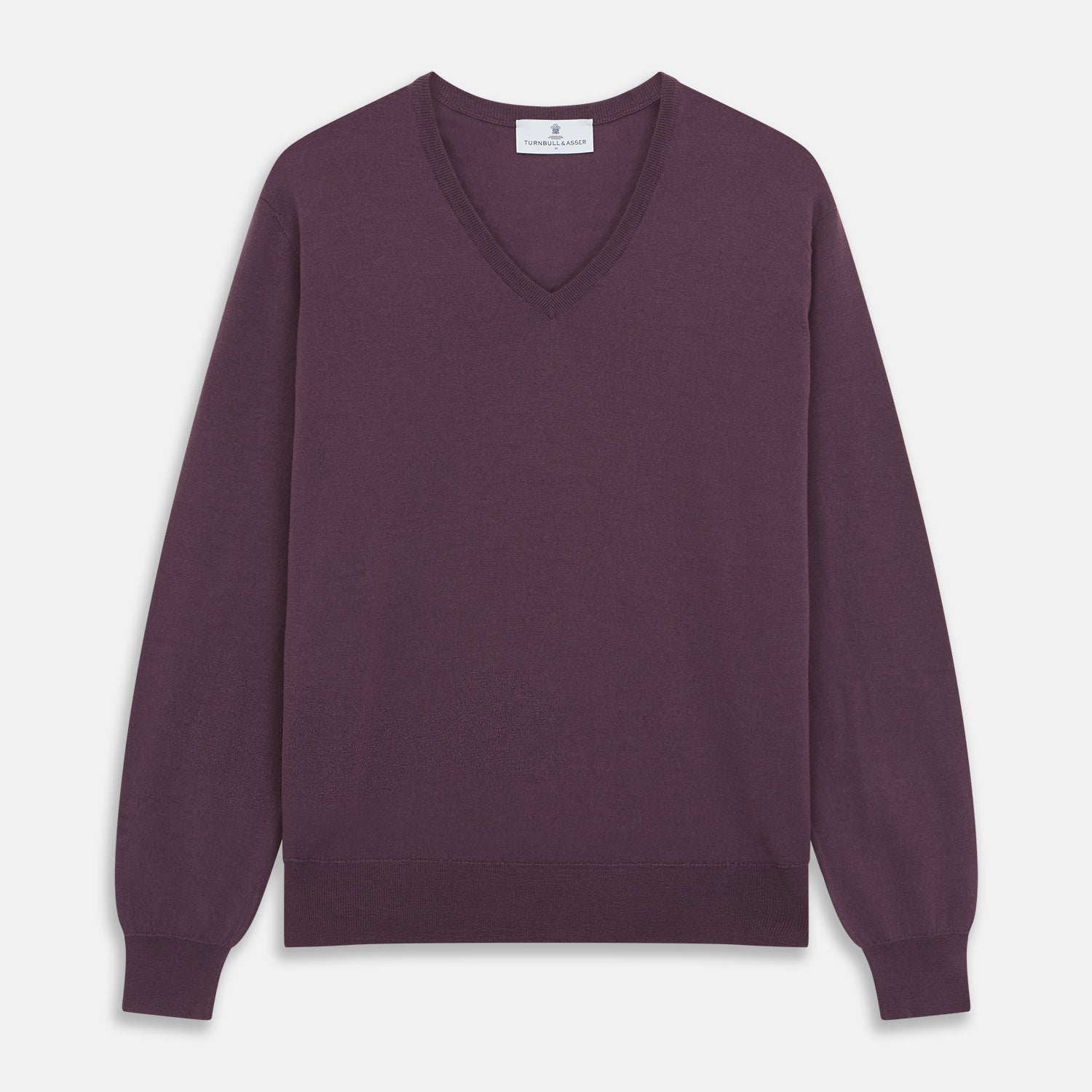 View 1 of product The Turnbull & Asser Plum Kennedy Merino V-Neck Jumper is a long-sleeved knitwear piece made from soft Italian wool, shown laid flat on a white background.