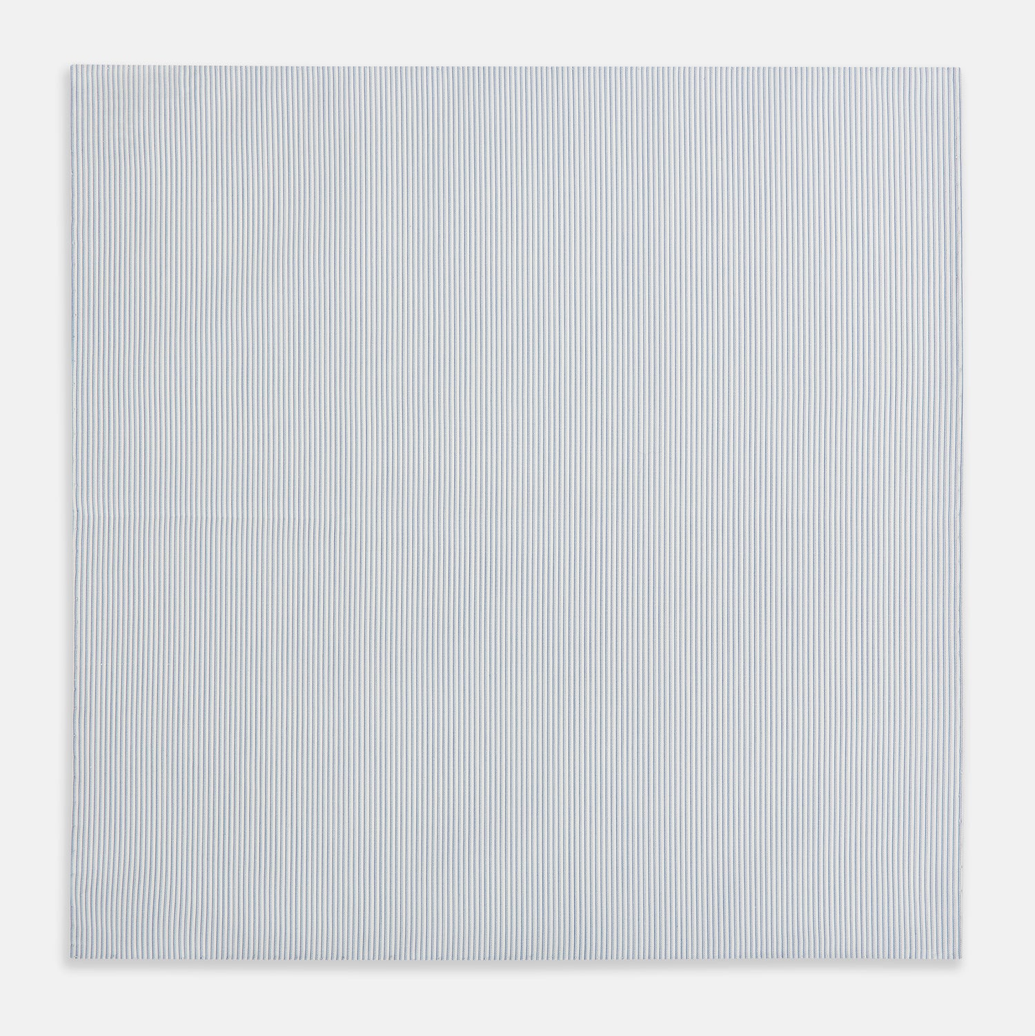 View 3 of product The Turnbull & Asser Sky Blue Hairline Stripe Hand-Rolled Handkerchief, featuring thin blue and white stripes and hand-rolled edges, is displayed flat on a white background.