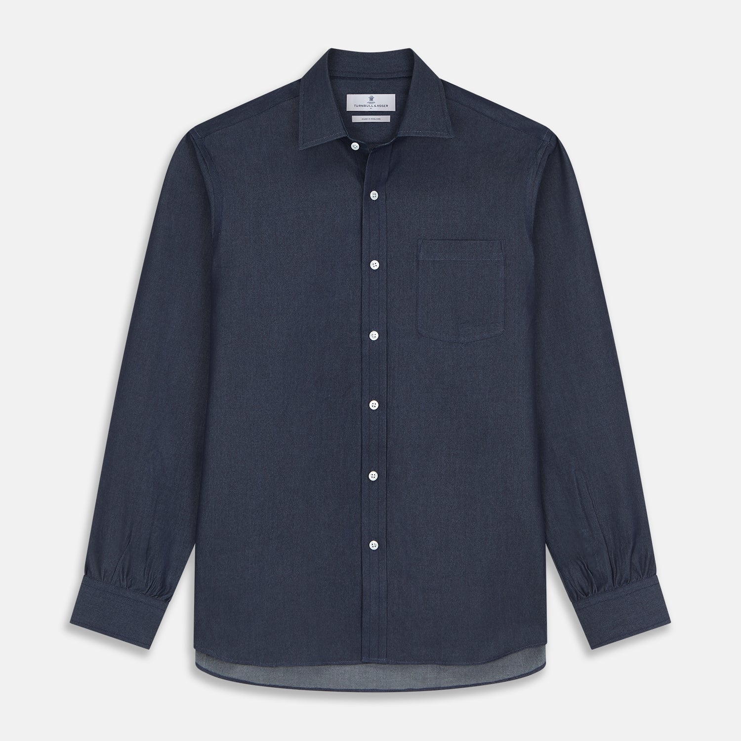 View 1 of product The Turnbull & Asser Blue Weekend Fit Finch Shirt features a Derby collar, chest pocket, classic white buttons, and timeless style, all in cotton. Laid flat on a white background.