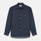 The Turnbull & Asser Blue Weekend Fit Finch Shirt features a Derby collar, chest pocket, classic white buttons, and timeless style, all in cotton. Laid flat on a white background.