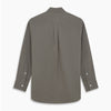 View 5 of product The Turnbull & Asser Dusty Sage Cotton Drill Weekend Fit Nevis Shirt features a button-down collar, long sleeves, two chest pockets, and white buttons, shown folded on a white background.
