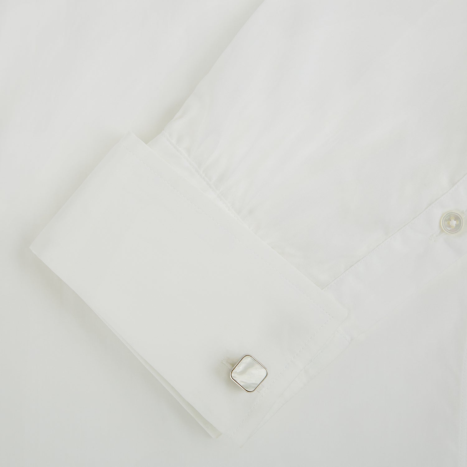 View 3 of product Turnbull & Asser Mother of Pearl Square Cufflinks feature sterling silver-toned frames with white, iridescent mother of pearl inlays, shown against a plain white background.