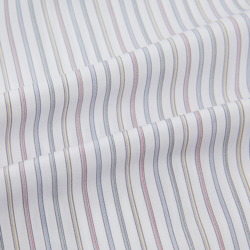 The Turnbull & Asser Multicoloured Music Stripe Mayfair Shirt features thin blue and white vertical stripes, a classic T&A collar, and buttoned cuffs, shown laid flat on a white background.