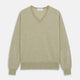 A light green Kennedy Merino V-neck jumper by Turnbull & Asser is laid flat on a white background. This knitwear piece features ribbed cuffs and hem, offering a simple, classic design ideal for any wardrobe.