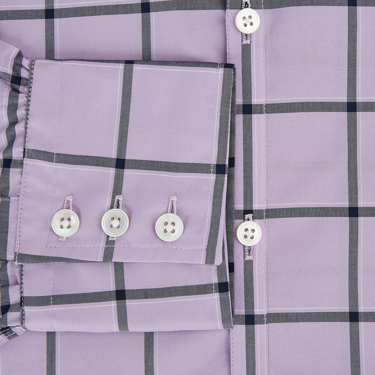 View 4 of product A long-sleeve, button-up Lilac Grid Check Windsor Shirt by Turnbull & Asser, featuring a black windowpane pattern and a refined Windsor collar, displayed on a plain white background.