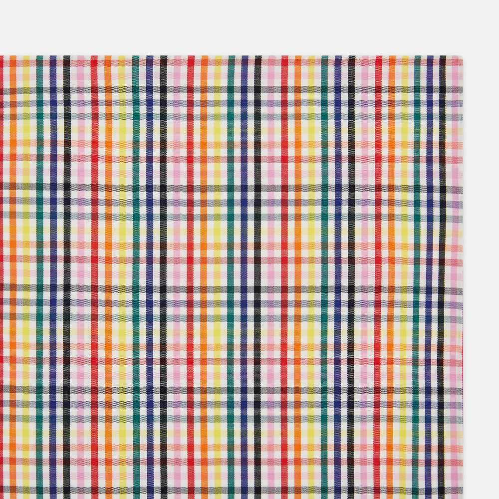 The Turnbull & Asser Hand Rolled Multi-coloured Grid Check Handkerchief features intersecting red, yellow, green, blue, and orange stripes on white—a vibrant and versatile gentleman’s accessory.