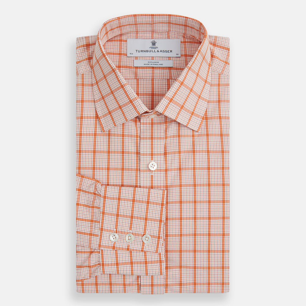 The Turnbull & Asser Orange Graph Overlay Check Mayfair Shirt is a soft organic cotton long-sleeve with button-down front, collar, and cuffs—an ideal capsule wardrobe staple—shown on a plain white background.