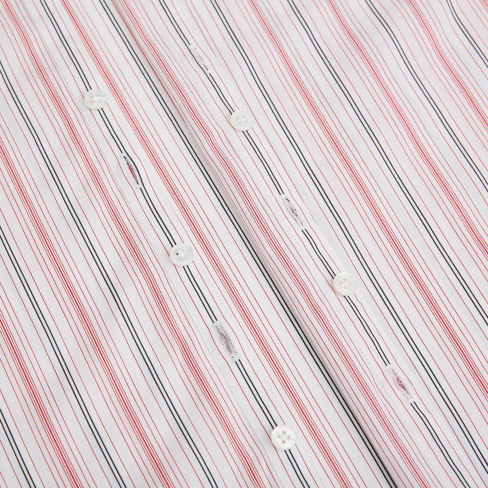 The Red Multi Pencil Stripe Windsor Shirt by Turnbull & Asser features long sleeves, buttoned cuffs, a Turnbull collar, and classic British tailoring with vertical red, pink, and white stripes.