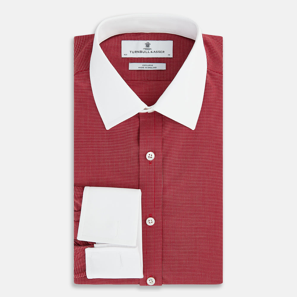 The Turnbull & Asser Dark Red Pin Check Shirt features a crisp white contrast collar and cuffs, with long sleeves and button-up design, shown against a white background.