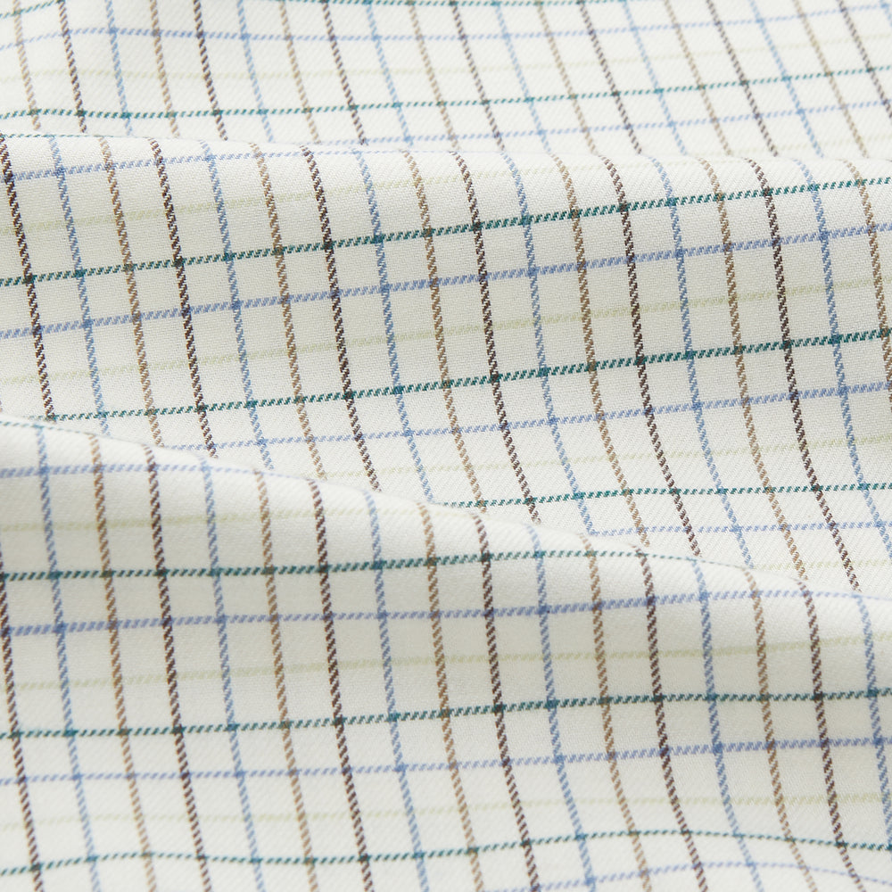 A Turnbull & Asser Green Tattersall Check Cashmerello Regular Fit Mayfair Shirt, featuring a long-sleeve button-up style with a green checkered pattern, is displayed on a plain white surface.