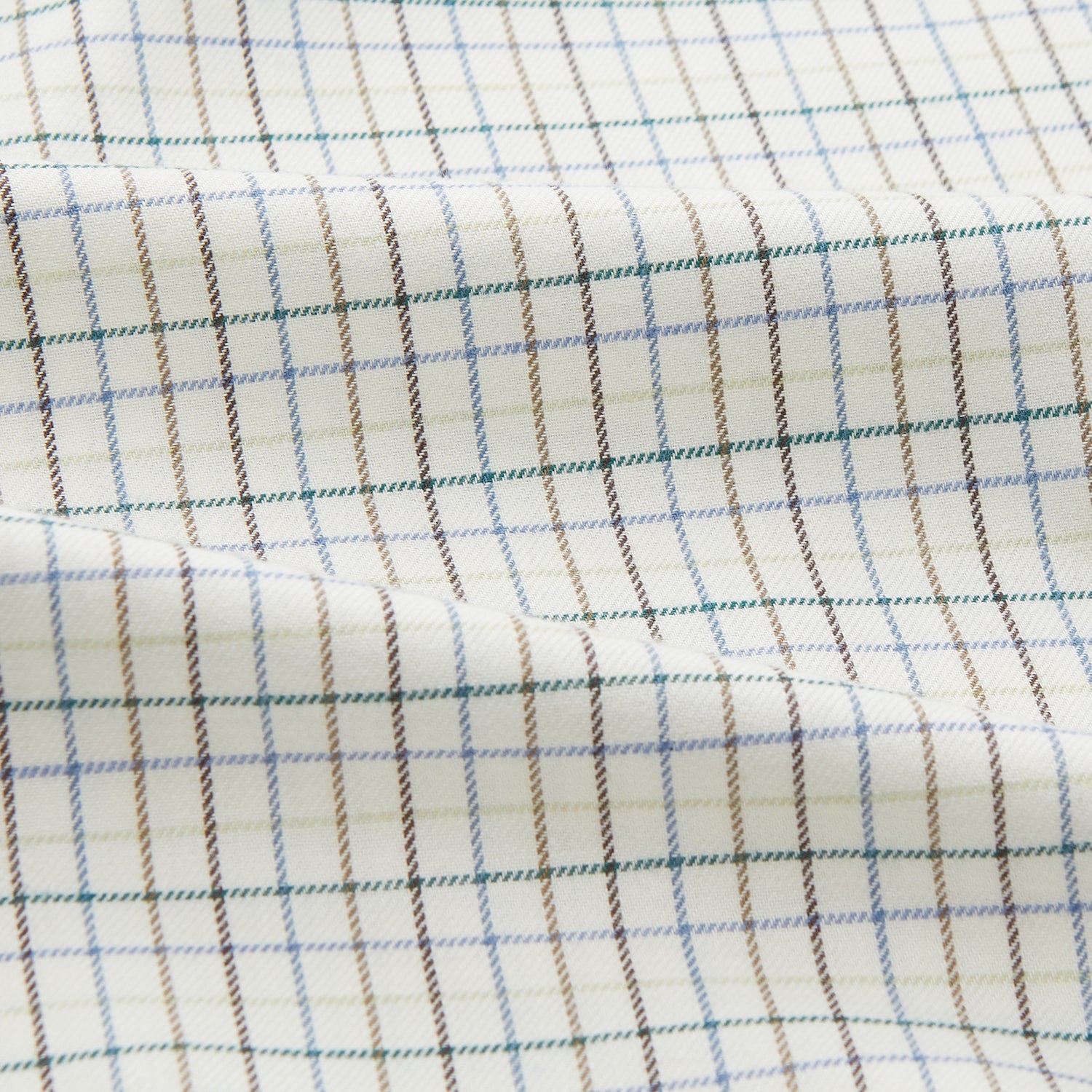 View 4 of product A Turnbull & Asser Green Tattersall Check Cashmerello Regular Fit Mayfair Shirt, featuring a long-sleeve button-up style with a green checkered pattern, is displayed on a plain white surface.